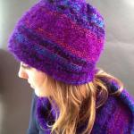 Handwoven hat with purple dominant color